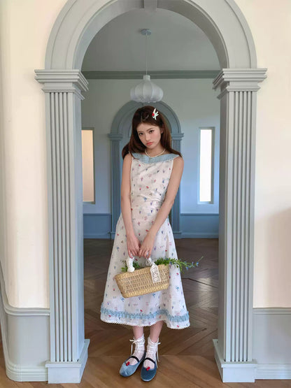 “Blue Meadow Letter” Misty Blue Floral Maxi Dress