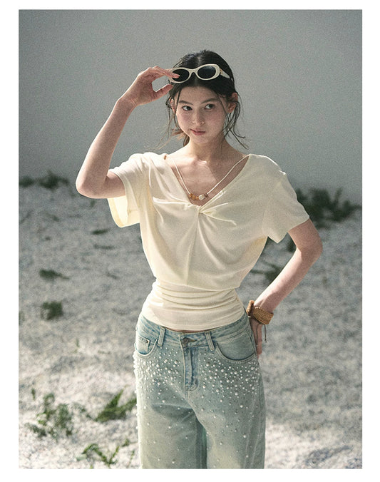 “White Between Breaths” Ivory Twist V-Neck Top