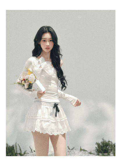少也眼 "Morning Mist Shoulder" Bow Off-Shoulder T-Shirt in Cloud White 52742574
