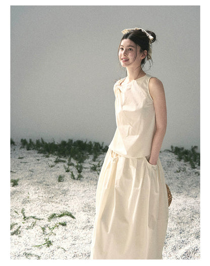 “Ivory Pleated Verse” Soft White Asymmetrical Twist Top & Skirt