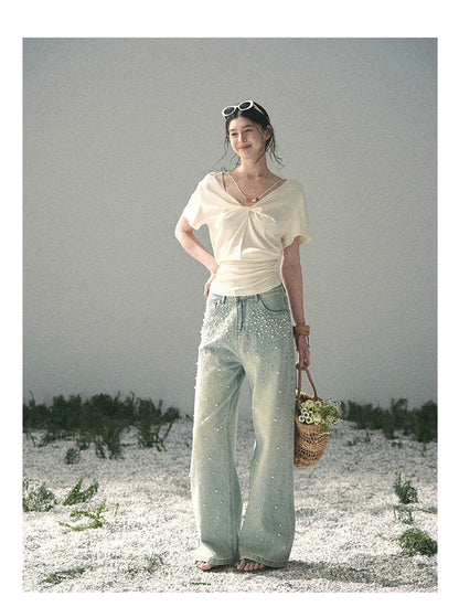 “White Between Breaths” Ivory Twist V-Neck Top