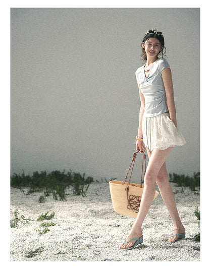 “Sheer Spring Whisper” Moonlight Blue Twist V-Neck Top