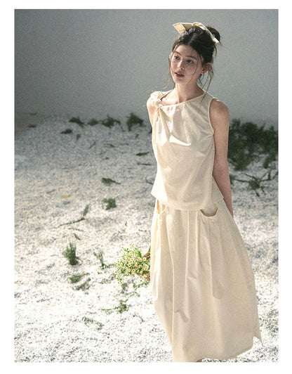 “Ivory Pleated Verse” Soft White Asymmetrical Twist Top & Skirt