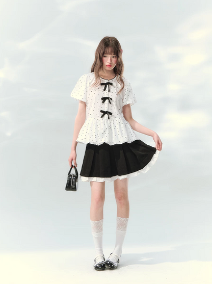“Polka Soufflé” White Polka Dot Bow Peplum Blouse